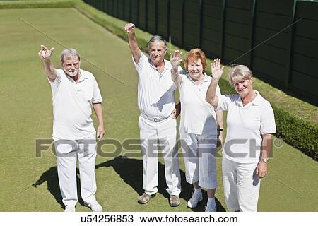 Older people waving from lawn View Large Photo Image Stock Image - Older people waving from lawn. Fotosearch
