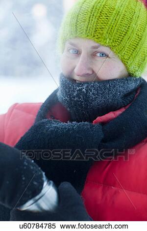 Older woman in winter clothes in snow View Large Photo Image Stock Photography - Older woman in winter clothes in snow. Fotosearch
