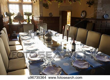 Ornate table settings in dining room View Large Photo Image Picture - Ornate table settings in dining room. Fotosearch