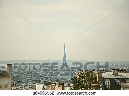 Stock Image - Parisian skyline with Eiffel Tower. Fotosearch