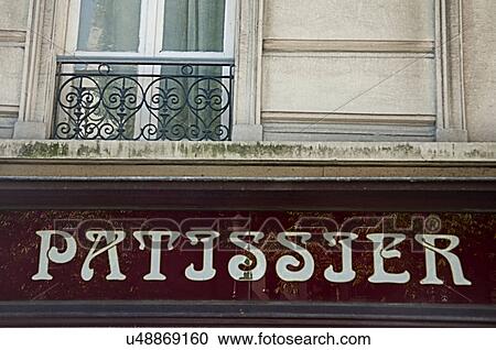 Patissier sign on French street View Large Photo Image Stock Image - Patissier sign on French street. Fotosearch