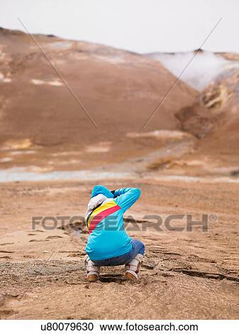 Photographer shooting in rural landscape View Large Photo Image Stock Image - Photographer shooting in rural landscape. Fotosearch