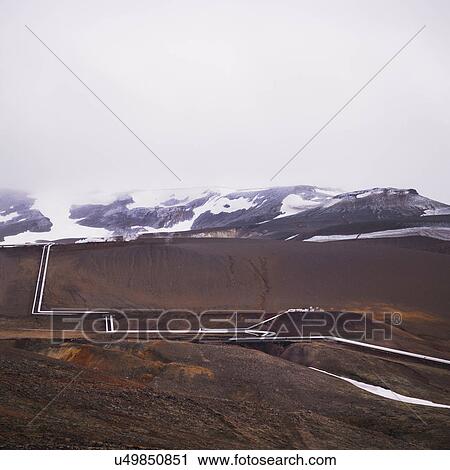 Pipeline winding in rural landscape View Large Photo Image Stock Image - Pipeline winding in rural landscape. Fotosearch