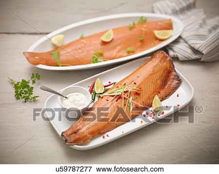 Plates of hot-smoked and cold-smoked hand-reared Scottish salmon fillets View Large Photo Image Stock Photo - Plates of hot-smoked and cold-smoked hand-reared Scottish salmon fillets. Fotosearch