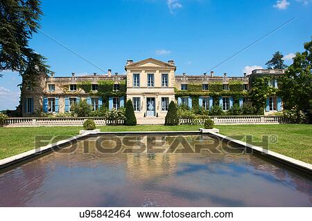 Picture - Pond in courtyard of French chateau. Fotosearch