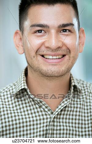 Portrait of a mid adult man smiling View Large Photo Image Stock Image - Portrait of a mid adult man smiling. Fotosearch