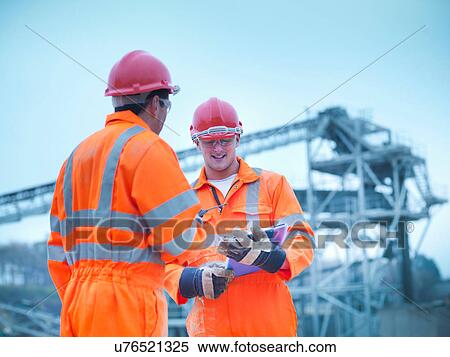 Quarryman and assistant in on site meeting in front of quarry screening plant View Large Photo Image Stock Photography - Quarryman and assistant in on site meeting in front of quarry screening plant. Fotosearch