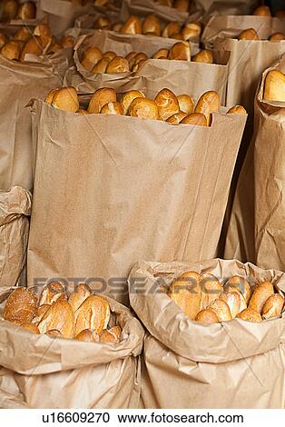 Stock Image - Sacks of baguettes for sale. Fotosearch