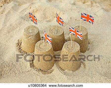 Picture - Sandcastles with Union Jack flags. Fotosearch