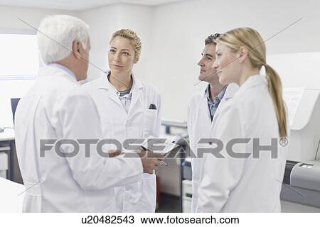 Scientists working in pathology lab View Large Photo Image Stock Image - Scientists working in pathology lab. Fotosearch