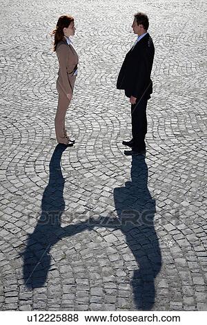 Shadows shaking hands outdoors View Large Photo Image Stock Photo - Shadows shaking hands outdoors. Fotosearch