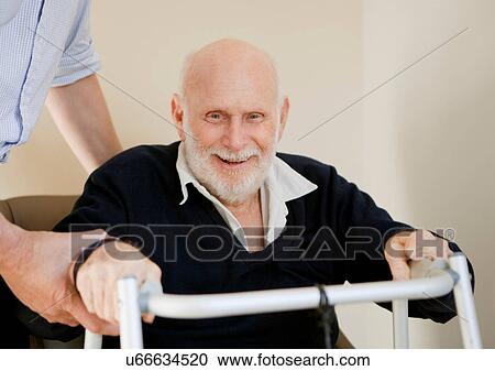 Smiling older man using walker View Large Photo Image Stock Image - Smiling older man using walker. Fotosearch