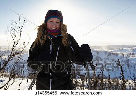 Smiling woman cross-country skiing View Large Photo Image Stock Photography - Smiling woman cross-country skiing. Fotosearch
