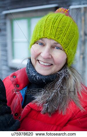 Smiling woman wearing beanie hat View Large Photo Image Stock Image - Smiling woman wearing beanie hat. Fotosearch