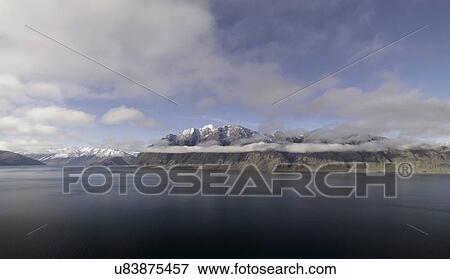 Still lake in rural landscape View Large Photo Image Stock Photo - Still lake in rural landscape. Fotosearch