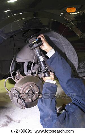 Student working on car engine View Large Photo Image Stock Photography - Student working on car engine. Fotosearch