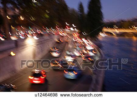 Time-lapse view of cars in city center View Large Photo Image Stock Photo - Time-lapse view of cars in city center. Fotosearch