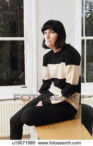 Woman blowing bubble View Large Photo Image Stock Photography - Woman blowing bubble. Fotosearch