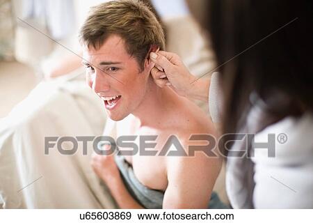 Woman grabbing teenage boy by ear View Large Photo Image Stock Photo - Woman grabbing teenage boy by ear. Fotosearch