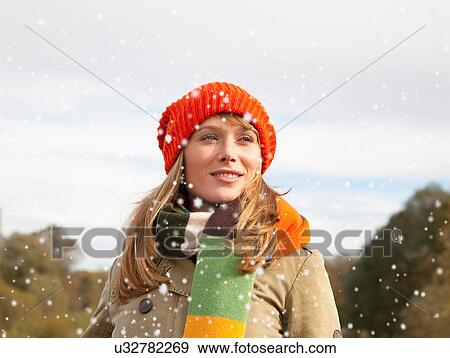 Woman smiling outdoors in snow View Large Photo Image Stock Photo - Woman smiling outdoors in snow. Fotosearch