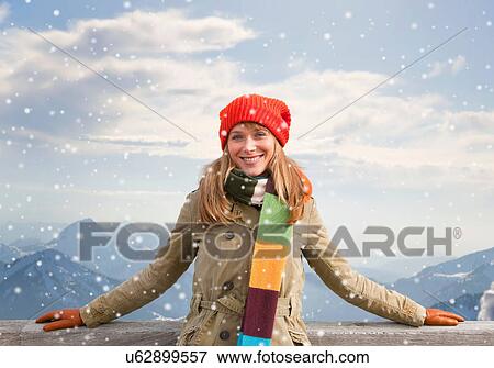 Woman smiling outdoors in snow View Large Photo Image Stock Photo - Woman smiling outdoors in snow. Fotosearch