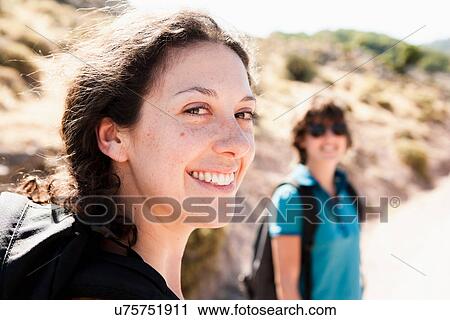 Woman smiling outdoors View Large Photo Image Stock Image - Woman smiling outdoors. Fotosearch