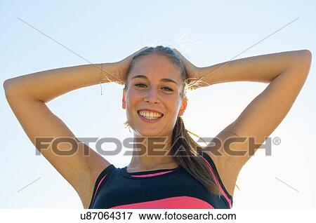 Woman smiling outdoors View Large Photo Image Stock Photo - Woman smiling outdoors. Fotosearch