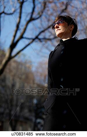 Woman walking in park View Large Photo Image Stock Photography - Woman walking in park. Fotosearch