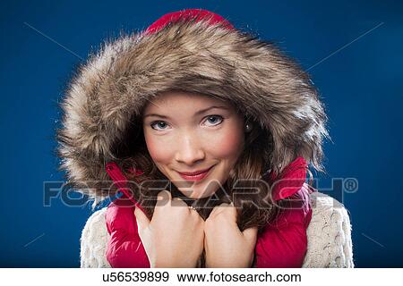 Woman wearing fur-lined parka View Large Photo Image Stock Photo - Woman wearing fur-lined parka. Fotosearch