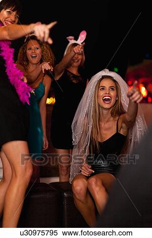 Women having bachelorette party in bar View Large Photo Image Stock Photography - Women having bachelorette party in bar. Fotosearch