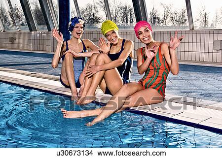Picture - Women playing in indoor pool. Fotosearch