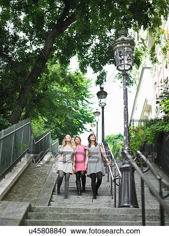 Women walking on city steps View Large Photo Image Stock Image - Women walking on city steps. Fotosearch