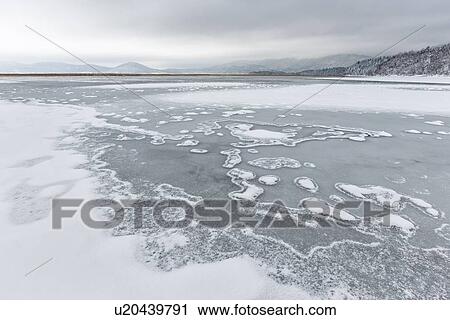 Slovenia in Winter: ice lake View Large Photo Image Stock Image - Slovenia in Winter: ice lake. Fotosearch