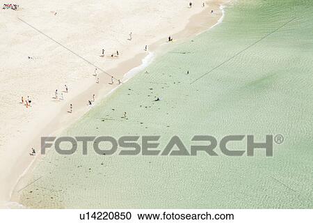 "Aerial view of holiday makers on beach, Porthcurno, Cornwall, UK" View Large Photo Image Stock Image - "Aerial view of holiday makers on beach, Porthcurno, Cornwall, UK". Fotosearch