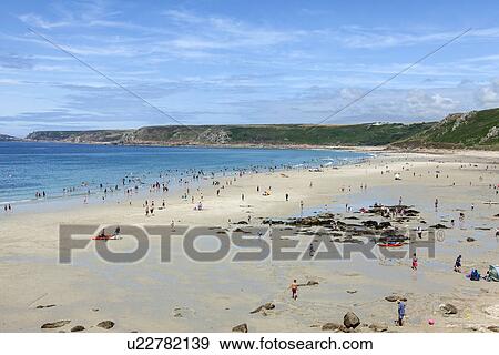 "Aerial view of holiday makers on beach, Cornwall, UK" View Large Photo Image Stock Photo - "Aerial view of holiday makers on beach, Cornwall, UK". Fotosearch