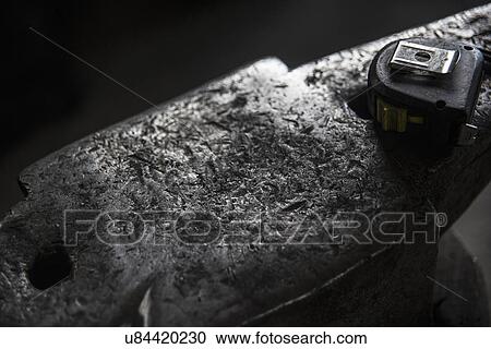 "Anvil, measuring tape" View Large Photo Image Stock Image - "Anvil, measuring tape". Fotosearch