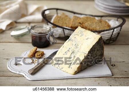 "Block of stilton cheese, bread, jam" View Large Photo Image Stock Photo - "Block of stilton cheese, bread, jam". Fotosearch