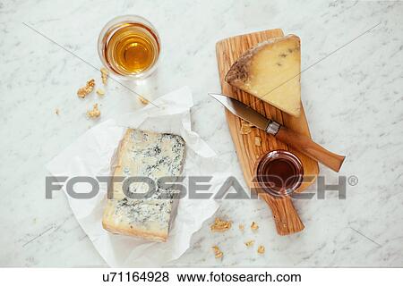 "Blue cheese, honey, sweet wine, knife" View Large Photo Image Stock Photo - "Blue cheese, honey, sweet wine, knife". Fotosearch
