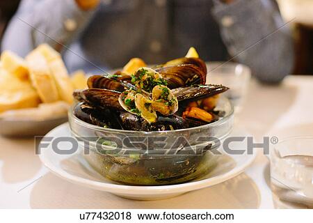 Bowl of mussels and clams View Large Photo Image Stock Photo - Bowl of mussels and clams. Fotosearch