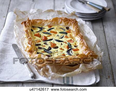 Butternut squash filo pastry tart View Large Photo Image Stock Photo - Butternut squash filo pastry tart. Fotosearch