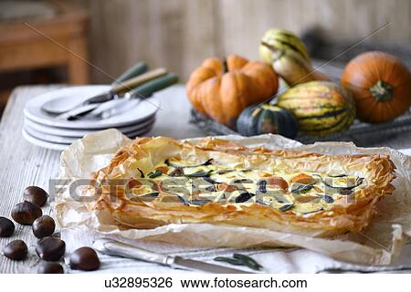 Butternut squash filo pastry tart View Large Photo Image Stock Photograph - Butternut squash filo pastry tart. Fotosearch