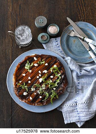 Carrot tarte tatin on a plate View Large Photo Image Stock Photo - Carrot tarte tatin on a plate. Fotosearch