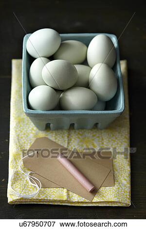Stock Photo - "Chicken eggs, chalk, tag, kitchen towel". Fotosearch