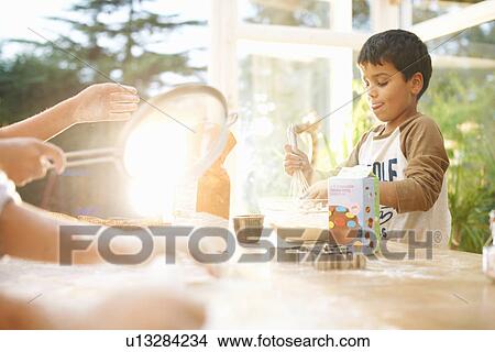Picture - Children baking in kitchen. Fotosearch