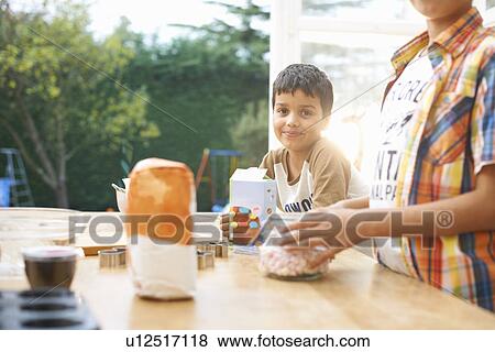Children baking in kitchen View Large Photo Image Stock Photo - Children baking in kitchen. Fotosearch