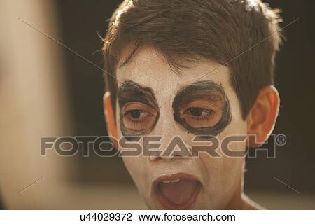 Close up of boy with skeleton face paint for halloween View Large Photo Image Stock Image - Close up of boy with skeleton face paint for halloween. Fotosearch