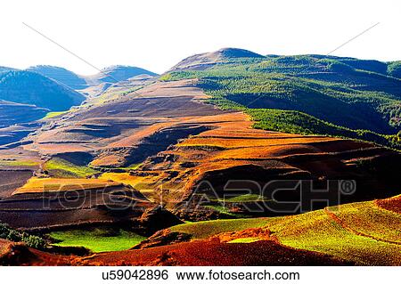 Stock Photograph - "Colourful fields, Yunnan, China. ". Fotosearch