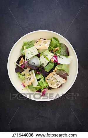 "Cucumber, herbs, pecorino cheese, thyme, walnuts salad with toasted bread" View Large Photo Image Stock Photograph - "Cucumber, herbs, pecorino cheese, thyme, walnuts salad with toasted bread". Fotosearch