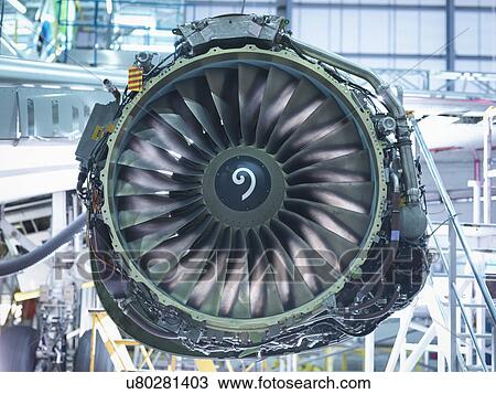Stock Image - Detail of jet engine in aircraft maintenance factory. Fotosearch