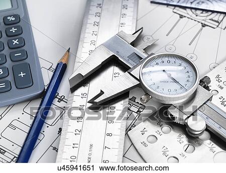 " Dial caliper and engineering measurement equipment, sitting on technical drawing" View Large Photo Image Stock Image - " Dial caliper and engineering measurement equipment, sitting on technical drawing". Fotosearch
